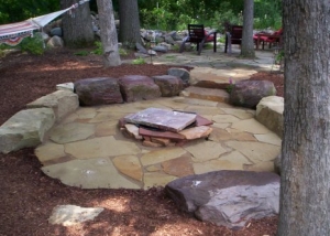 Flagstone patio with stone benches