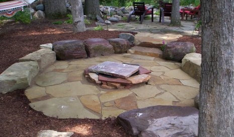 Flagstone patio with stone benches